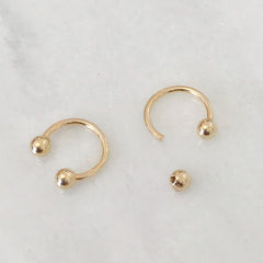 Barbell Collection: 14K Gold Double Ball Circular Horseshoe Earrings
